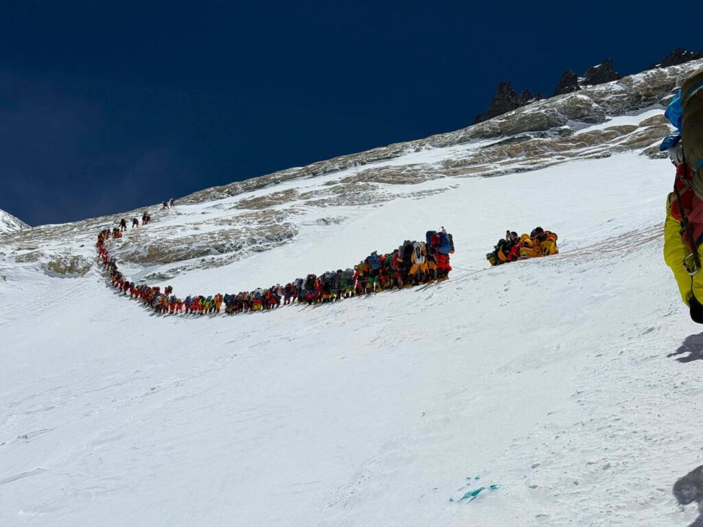 Everest sees historic rush as 274 climbers summit in one day